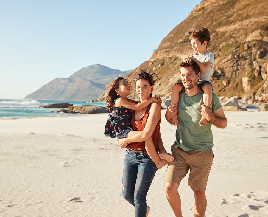 a happy family on the beach